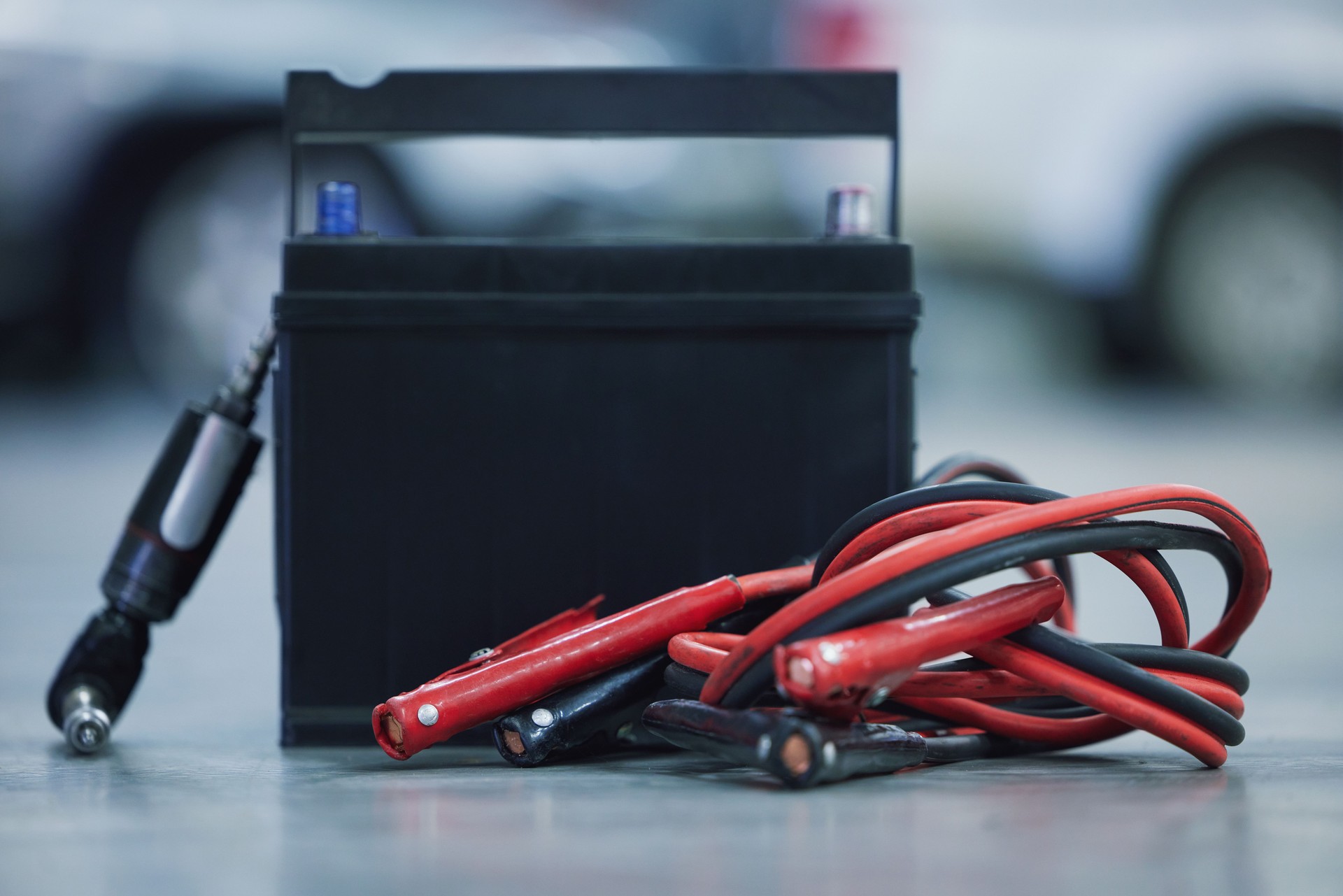 Shot of a lead-acid battery on the floor of a car service center