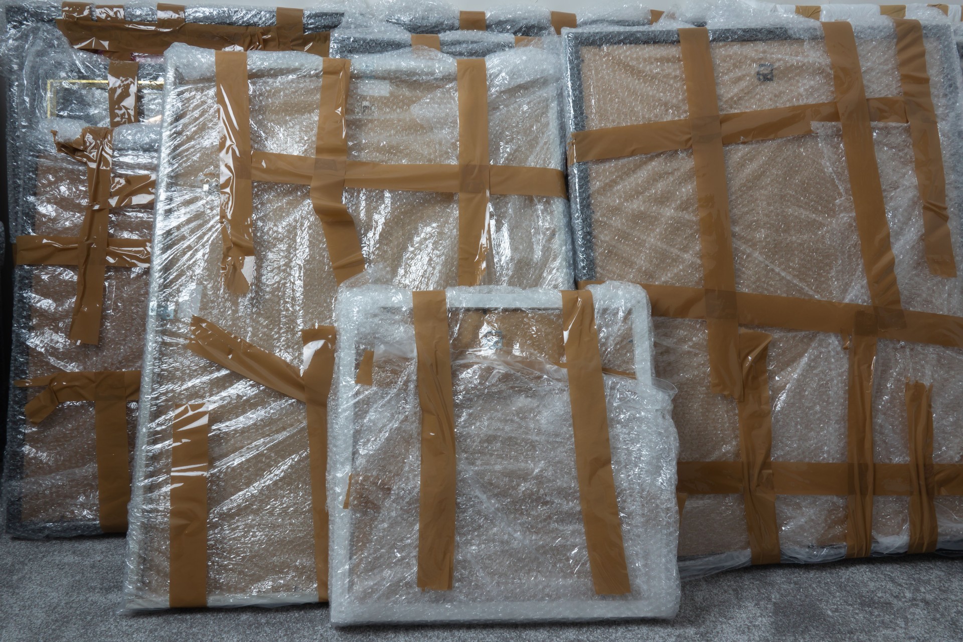 Packaged Paintings Wrapped in Bubble Wrap and Tape